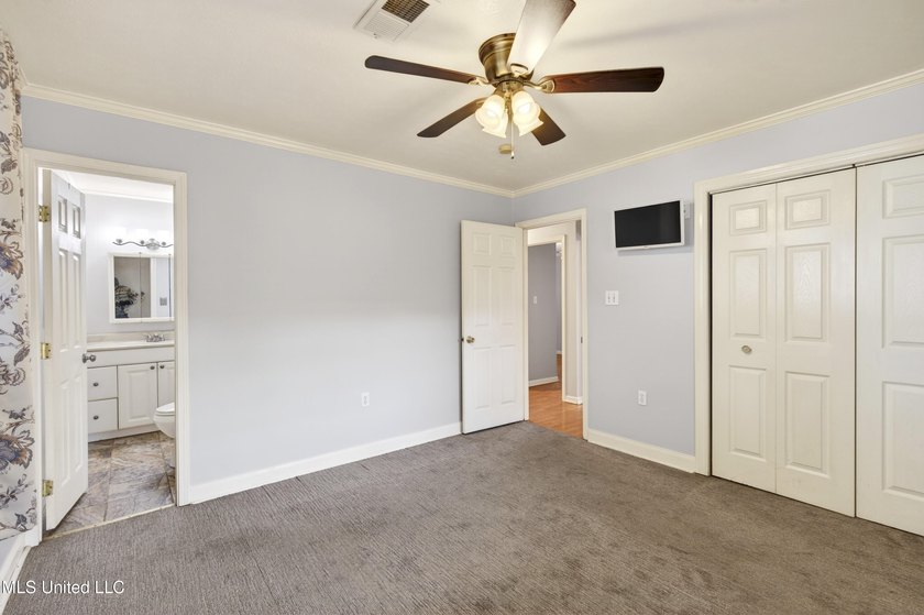 This well-maintained 3-bedroom brick home in Long Beach offers a - photo 17