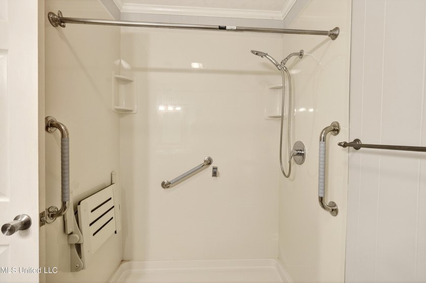 This well-maintained 3-bedroom brick home in Long Beach offers a - photo 23