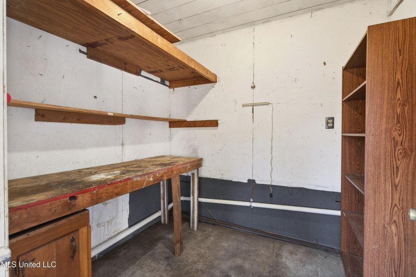 This well-maintained 3-bedroom brick home in Long Beach offers a - photo 30