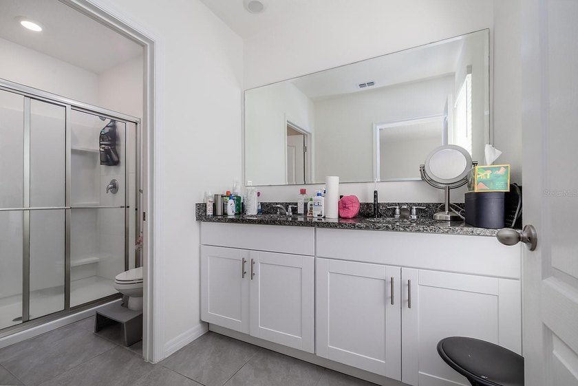 Welcome home to Bella Oaks! Incredible townhouse located in the - photo 17