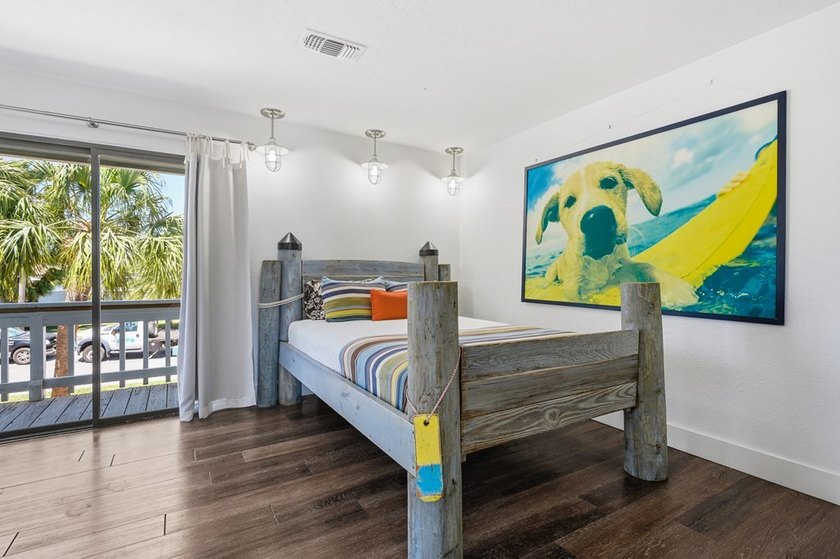 Welcome to this beautiful Key Allegro canal front home. Located - photo 29