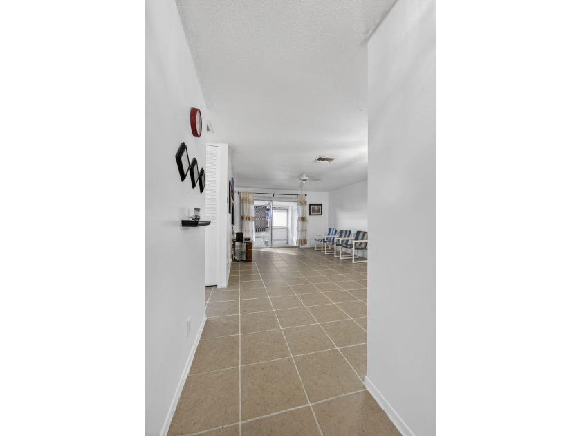 Welcome home to this inviting residence featuring tile floors &amp; - photo 6