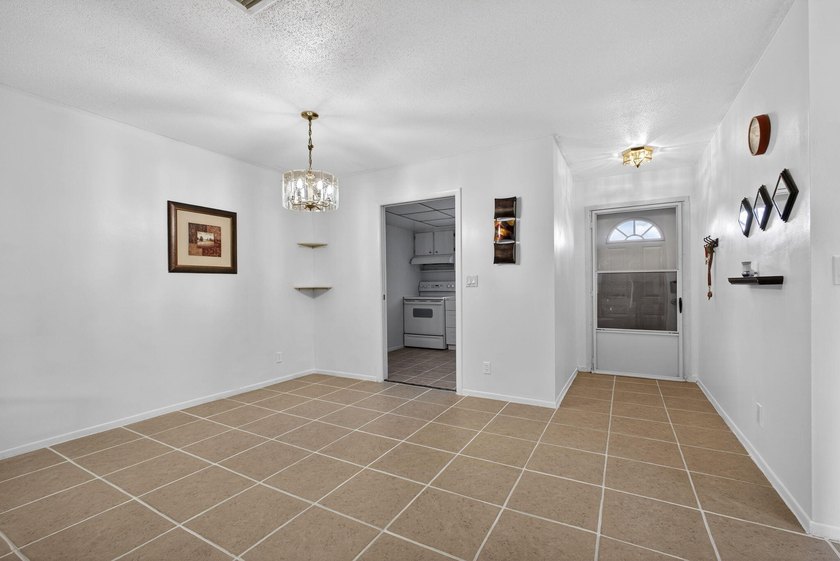 Welcome home to this inviting residence featuring tile floors &amp; - photo 7