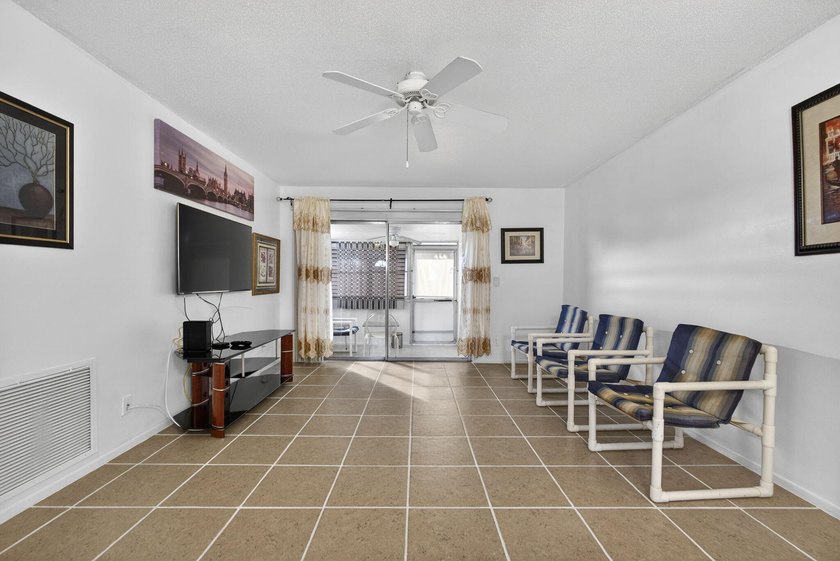 Welcome home to this inviting residence featuring tile floors &amp; - photo 10