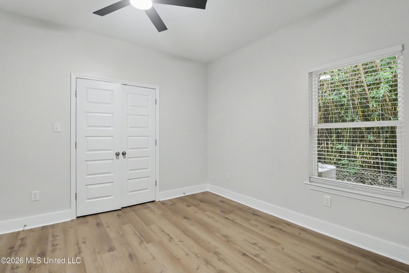 Welcome to effortless coastal living in this beautifully crafted - photo 12