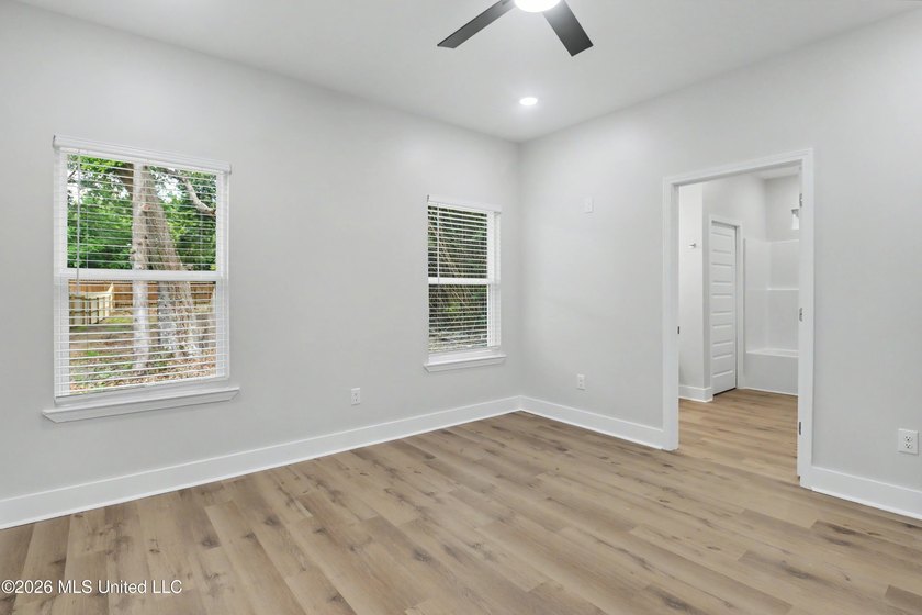 Welcome to effortless coastal living in this beautifully crafted - photo 16