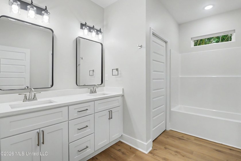 Welcome to effortless coastal living in this beautifully crafted - photo 17