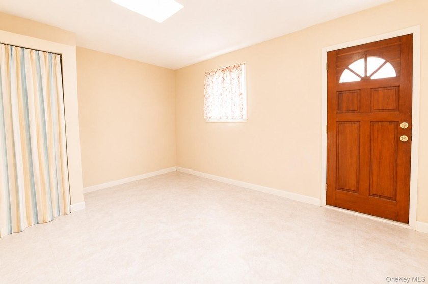 After 45 years, this charming semi-detached brick townhouse is - photo 11