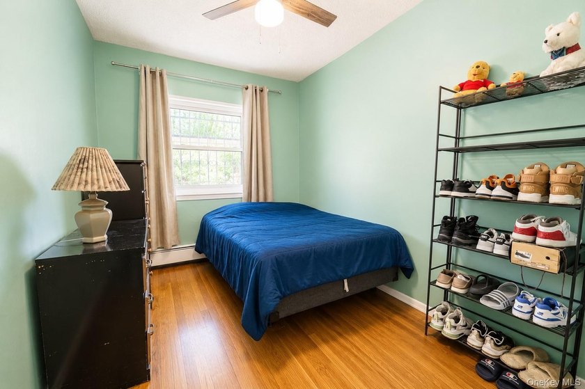 After 45 years, this charming semi-detached brick townhouse is - photo 17