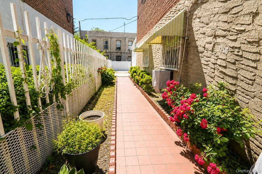 After 45 years, this charming semi-detached brick townhouse is - photo 23