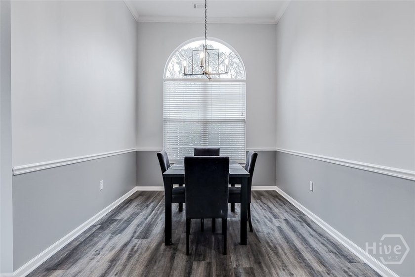 Welcome home to 220 Parkview Court, featuring updated LVP - photo 8