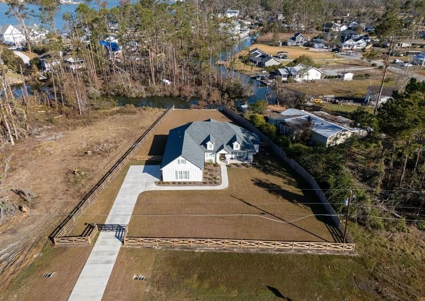 BEAUTIFUL PRACTICALLY NEW HOME (Built in 2023) on the CANAL with - photo 3