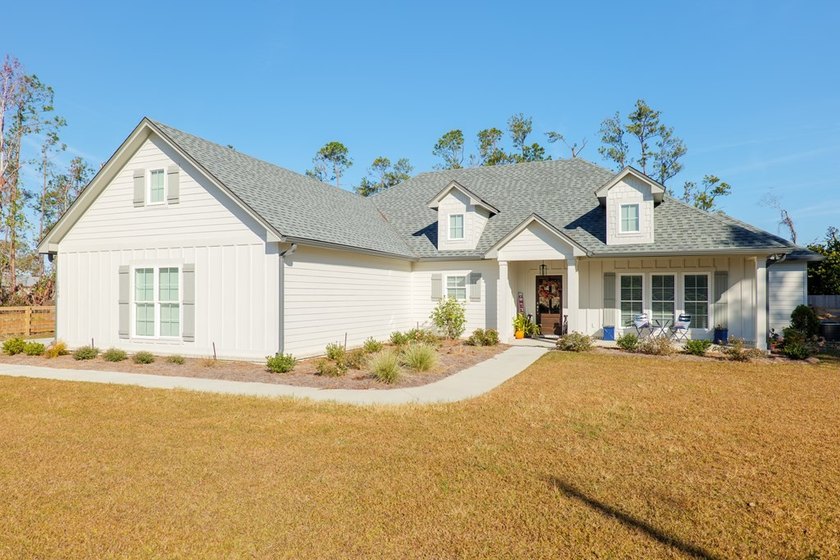 BEAUTIFUL PRACTICALLY NEW HOME (Built in 2023) on the CANAL with - photo 5
