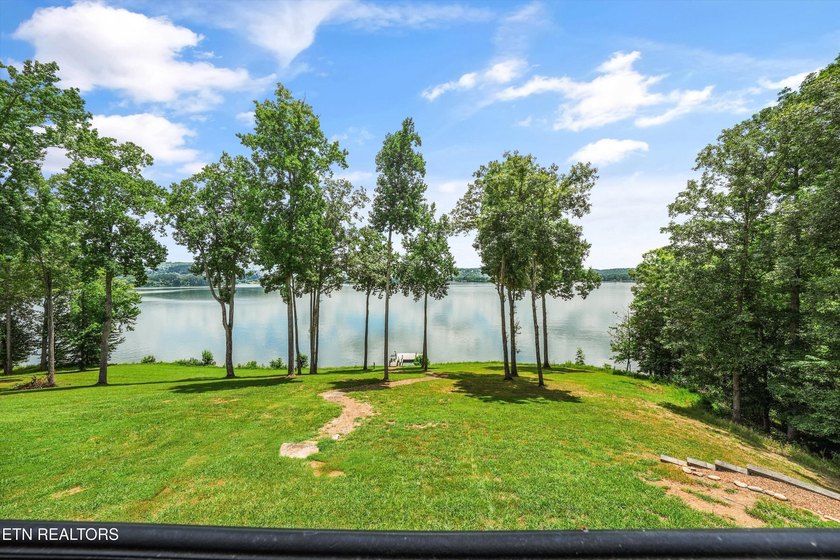 Experience luxury lakefront living in this exceptional 5-bedroom - photo 7