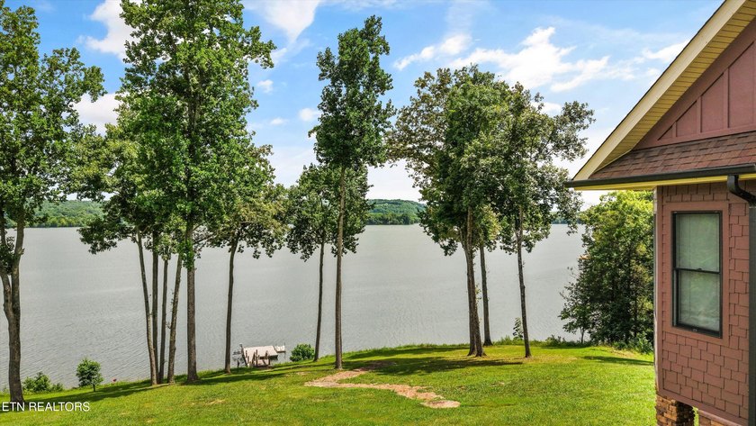 Experience luxury lakefront living in this exceptional 5-bedroom - photo 8