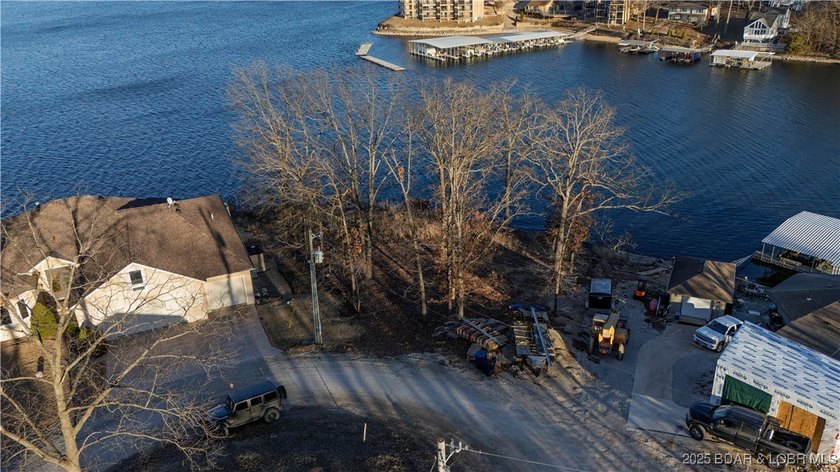 This rare double lakefront lot offers unbeatable panoramic views - photo 11