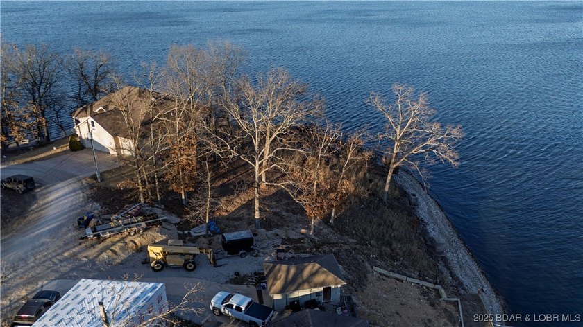 This rare double lakefront lot offers unbeatable panoramic views - photo 12