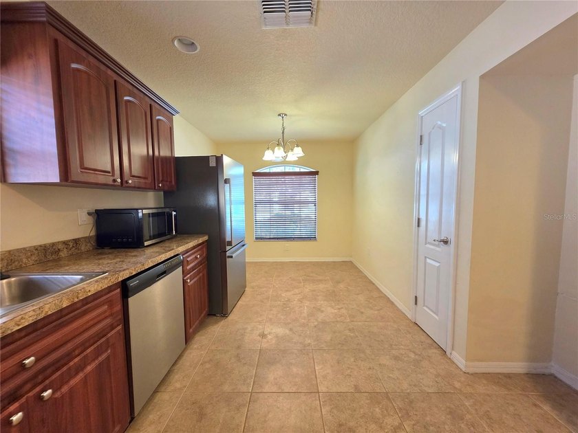 Sand Ridge Community 3 Bedroom 2 Full Baths And A 2 Car Garage- - photo 16