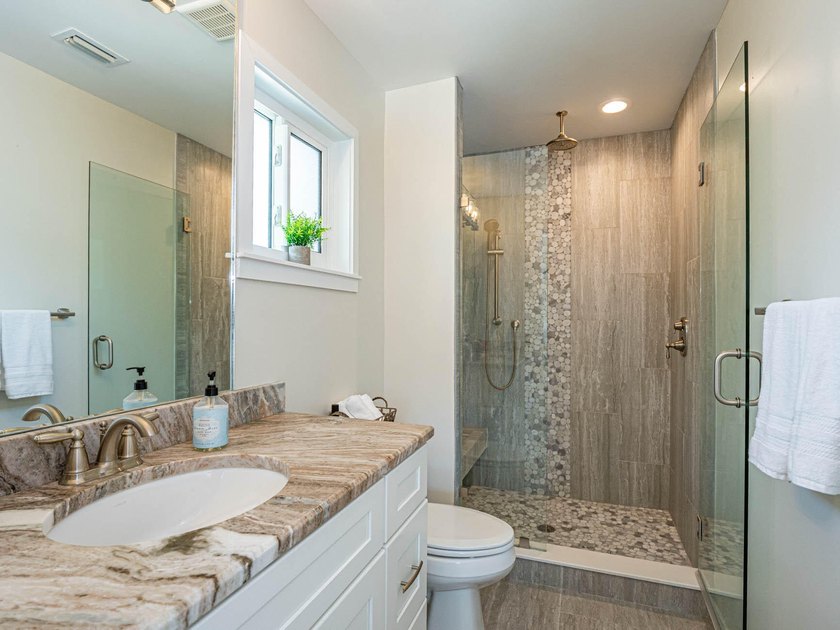 Welcome to this waterfront single-story residence in Coral Cove - photo 7