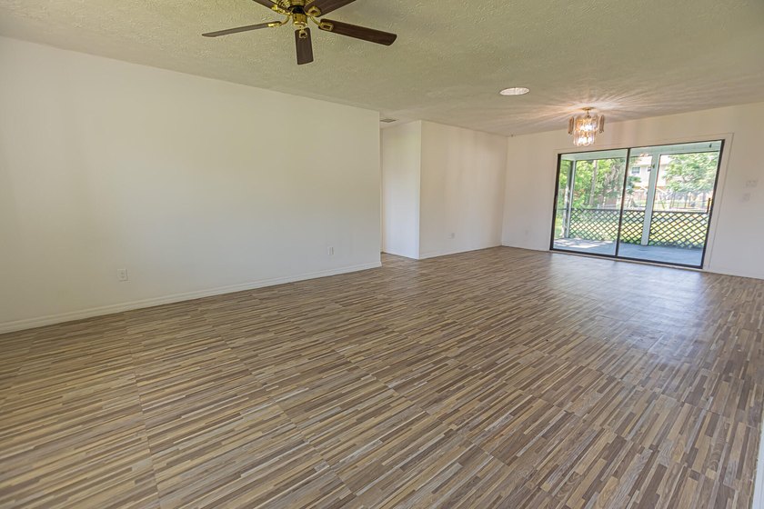 Opportunity awaits! This freshly painted 2-bedroom, 2-bath home - photo 2