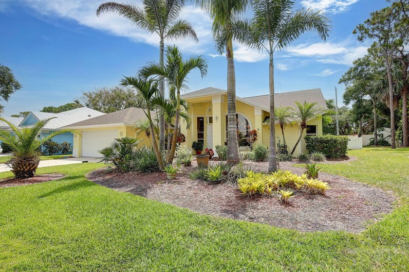 Palm trees sway over your private, screened pool at this move-in - photo 4
