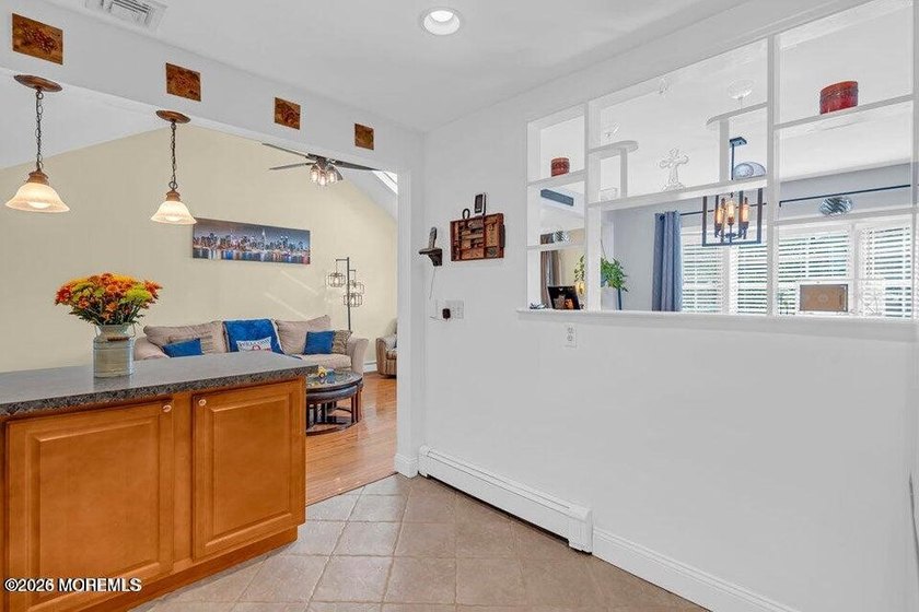 Renovated L-shaped California Ranch w/ an open floor plan - photo 22