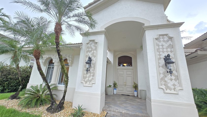 Welcome to this immaculate home in the exclusive gated community - photo 4