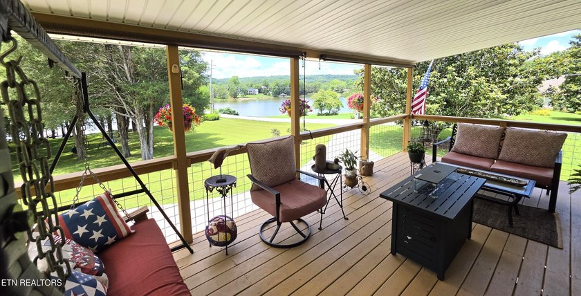 Discover this beautiful 3 bedroom, 2.5 bathroom LAKEFRONT home - photo 2