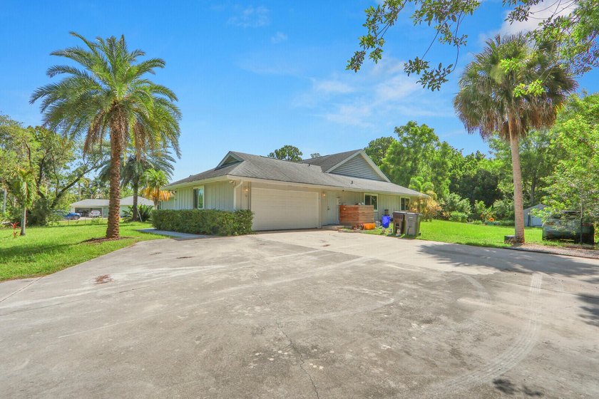 New Listing! Well-maintained 3-bedroom, 2-bath home on over an - photo 3