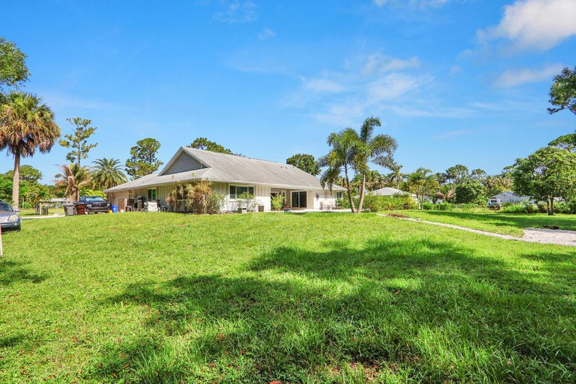 New Listing! Well-maintained 3-bedroom, 2-bath home on over an - photo 4