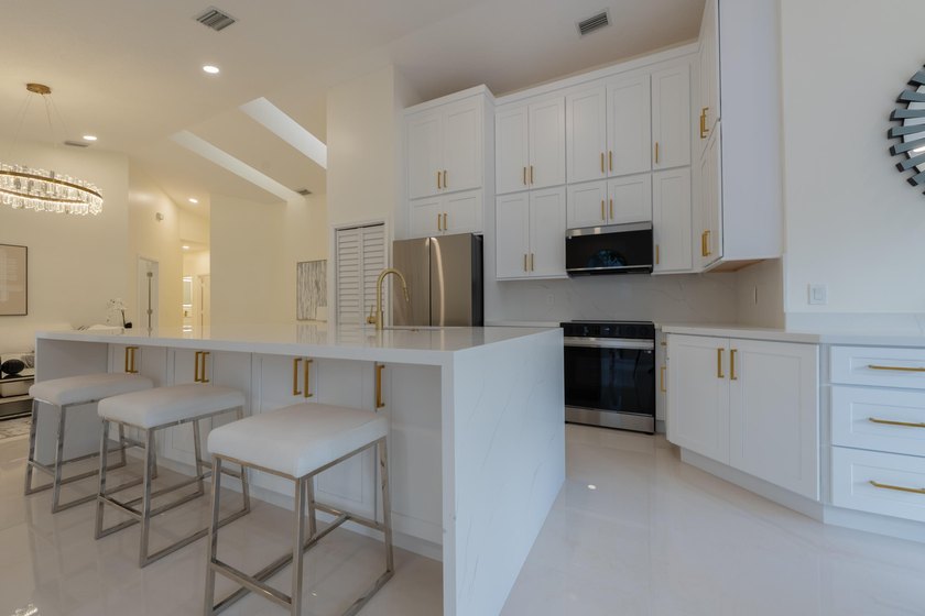Welcome to this 3/2 house in the central-Boca neighborhood of - photo 3