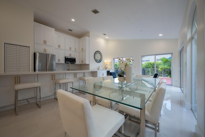 Welcome to this 3/2 house in the central-Boca neighborhood of - photo 7