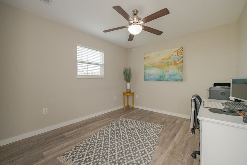 Nestled in the waterfront community of Holiday Beach, this - photo 38