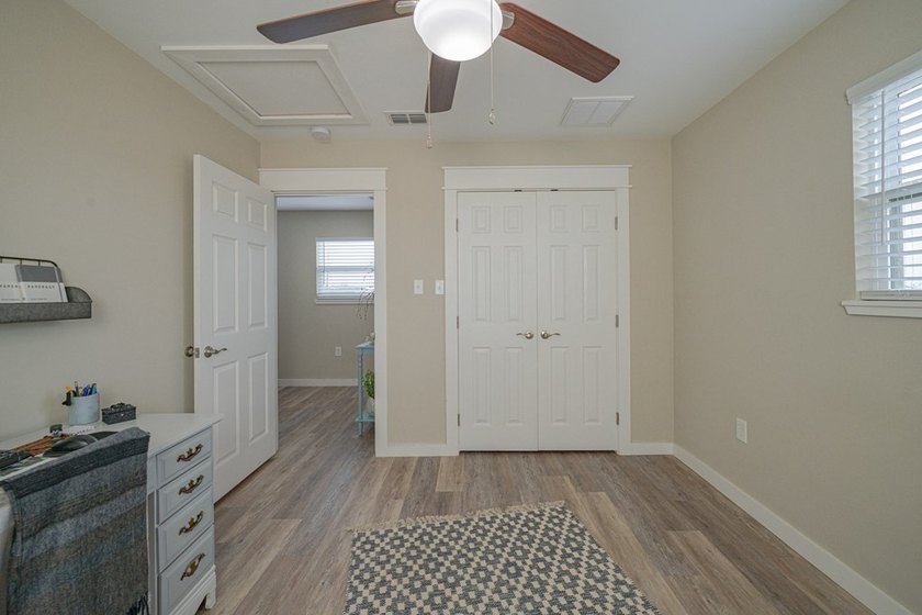 Nestled in the waterfront community of Holiday Beach, this - photo 41
