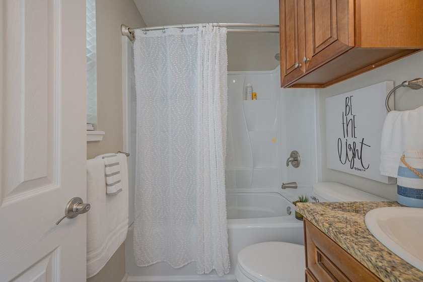 Nestled in the waterfront community of Holiday Beach, this - photo 45