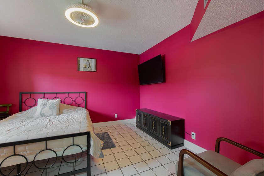 Welcome to this spacious 2-bedroom, 2-bath condominium located - photo 4