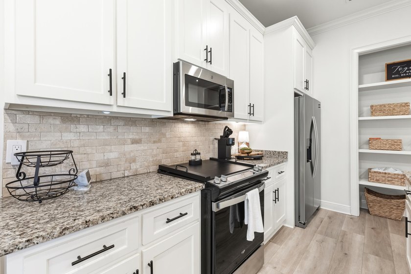 Fully renovated and move-in ready, this exceptional 4BR/4BA - photo 14