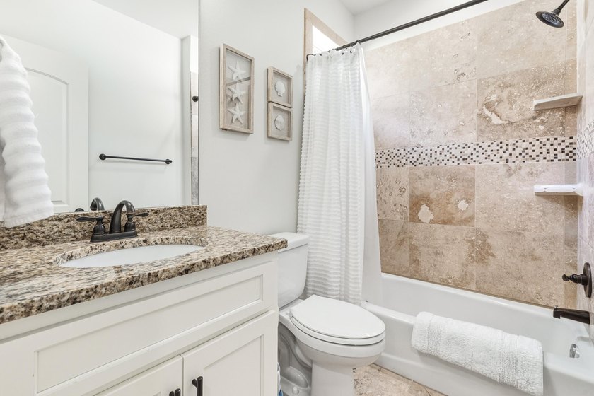 Fully renovated and move-in ready, this exceptional 4BR/4BA - photo 35