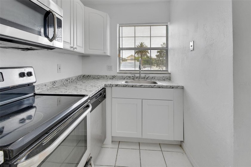 Welcome to a beautifully updated and meticulously maintained - photo 7