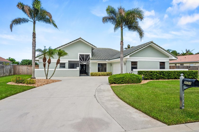 Welcome to Palm City's best-kept secrets! Nestled in highly - photo 3