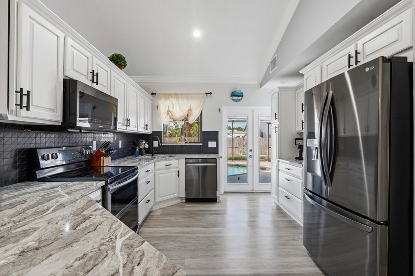 Welcome to Palm City's best-kept secrets! Nestled in highly - photo 10