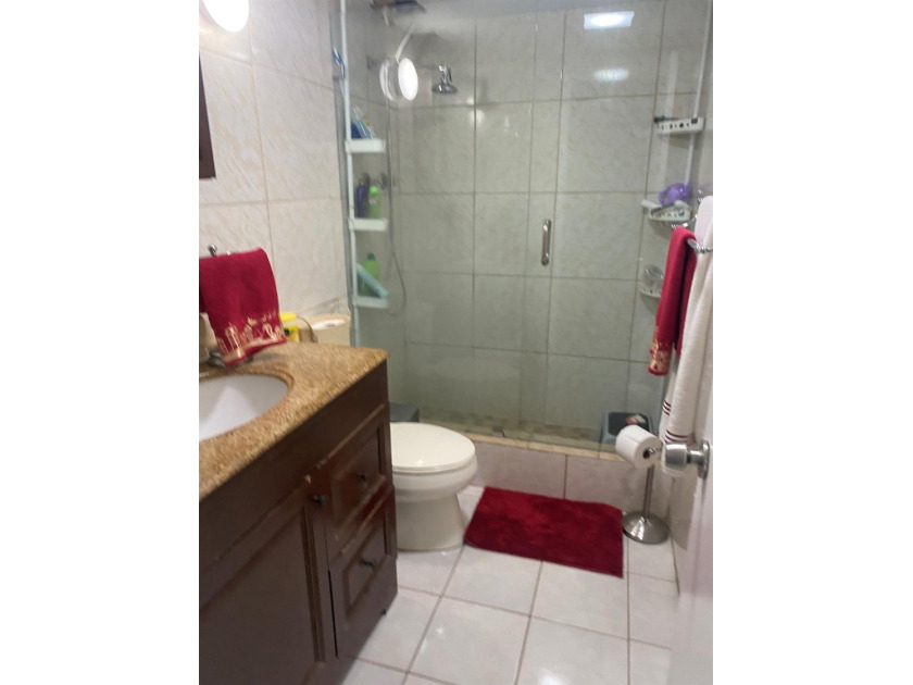 Welcome to this charming 3-bedroom, 2-bathroom condominium - photo 11