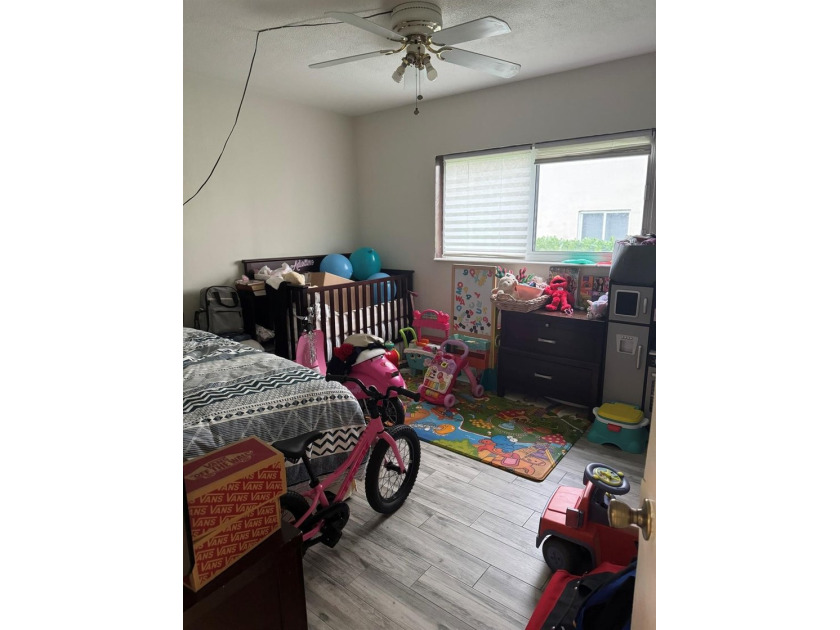 Welcome to this charming 3-bedroom, 2-bathroom condominium - photo 12