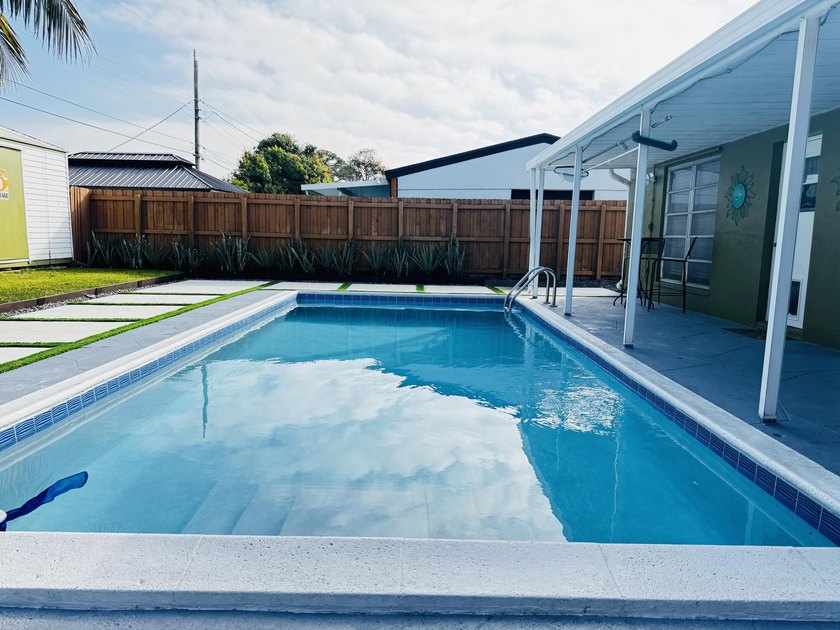 Create lasting family memories in this 3/2 pool Home in - photo 2