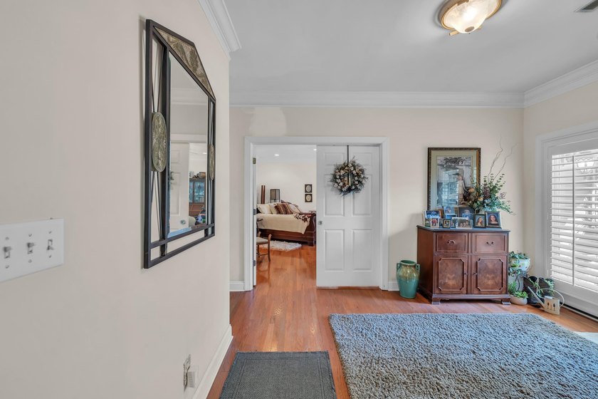 Situated beneath towering oak trees on a secluded one-acre - photo 22