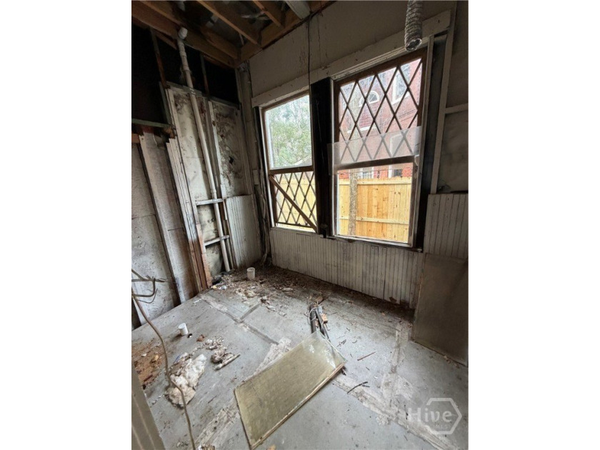217 E 38th St is a completely gutted, two-story single-family - photo 8