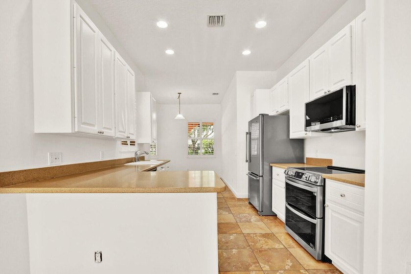 Rarely available single-story pool home in the highly - photo 9
