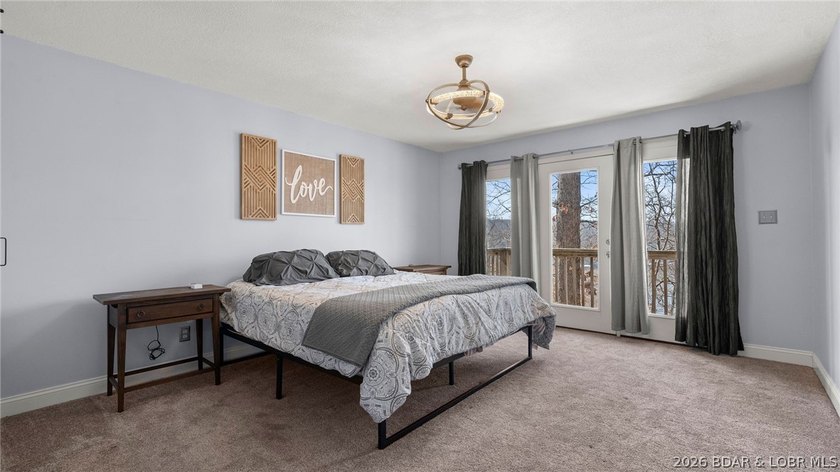Experience elevated lakefront living in this luxury 4-bedroom, 3 - photo 19