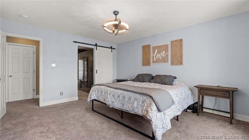 Experience elevated lakefront living in this luxury 4-bedroom, 3 - photo 20