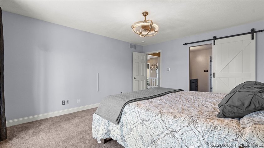 Experience elevated lakefront living in this luxury 4-bedroom, 3 - photo 21